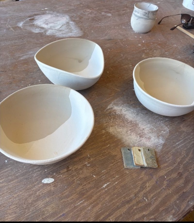 Untitled — three white bowls on the table, still at the idea stage